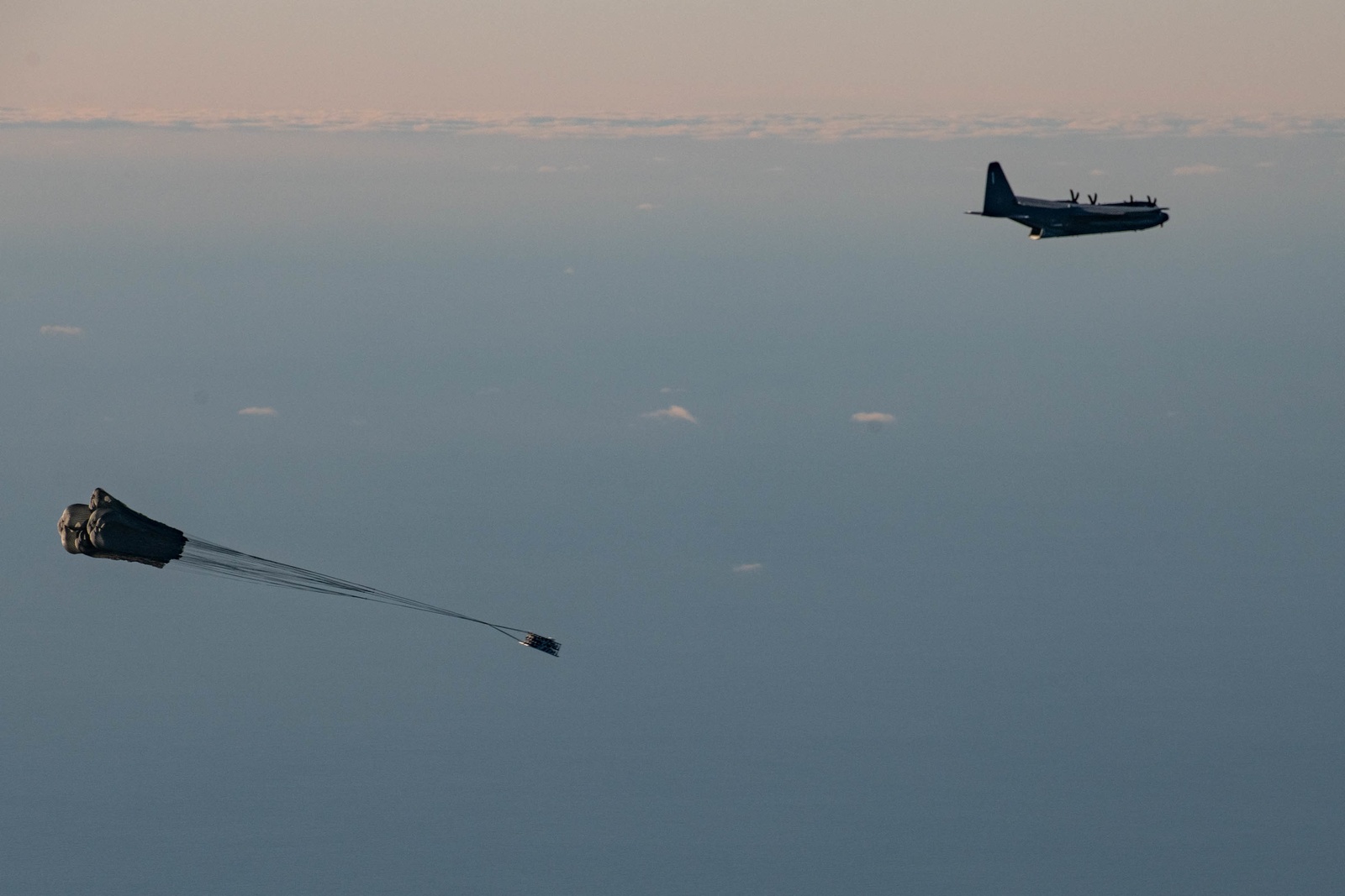 Air Force Wants Cargo-Plane-Launched Drone Swarms That Build Their Own Defensive Perimeter