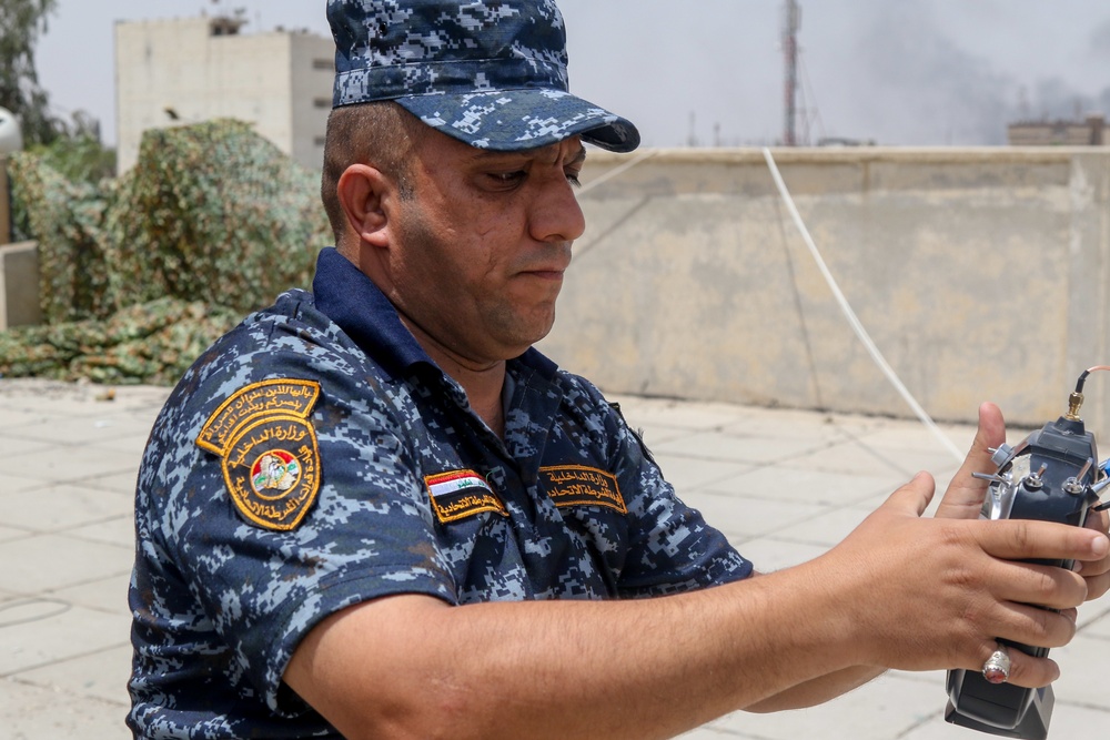 ISIS Drone Warfare in Iraq and Syria: How Commercial Quadcopters Became a Military Weapon