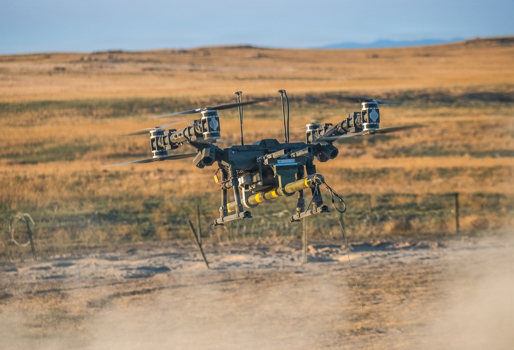 Soldiers Stay Under Cover: Oregon Guard Flies a Heavy-Lift Drone to Breach Wire With a WWII-Era Bangalore Torpedo
